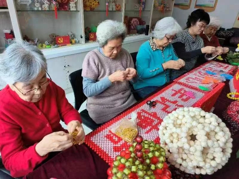 见行见效津彩绽放活动参赛作品巧手编制中国梦指尖开出幸福花